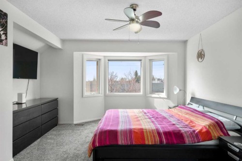 107 Cedargrove Way Sw, Calgary, AB - Indoor Photo Showing Bedroom