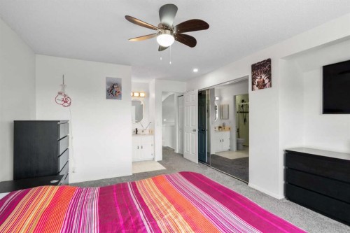 107 Cedargrove Way Sw, Calgary, AB - Indoor Photo Showing Bedroom