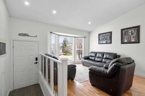 107 Cedargrove Way Sw, Calgary, AB - Indoor Photo Showing Living Room
