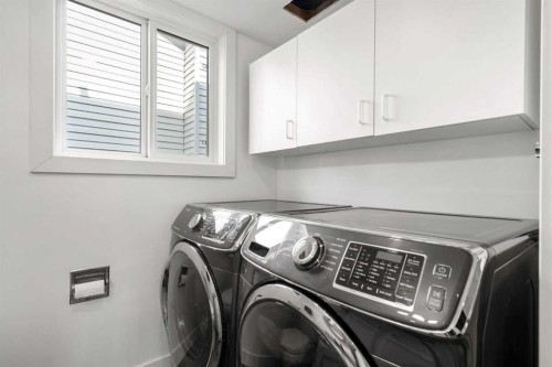 107 Cedargrove Way Sw, Calgary, AB - Indoor Photo Showing Laundry Room