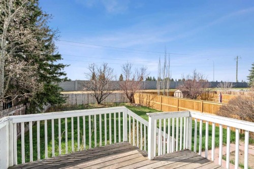 107 Cedargrove Way Sw, Calgary, AB - Outdoor With Deck Patio Veranda