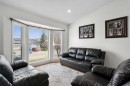 107 Cedargrove Way Sw, Calgary, AB  - Indoor Photo Showing Living Room 