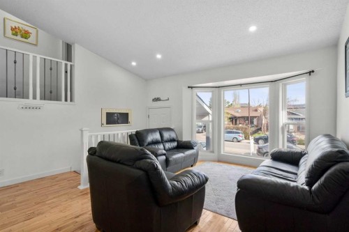 107 Cedargrove Way Sw, Calgary, AB - Indoor Photo Showing Living Room