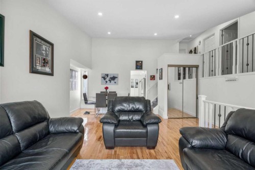 107 Cedargrove Way Sw, Calgary, AB - Indoor Photo Showing Living Room