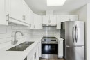 2309-2309 Hawksbrow Point Nw, Calgary, AB  - Indoor Photo Showing Kitchen With Stainless Steel Kitchen With Double Sink With Upgraded Kitchen 