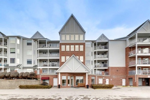 2309-2309 Hawksbrow Point Nw, Calgary, AB - Outdoor With Facade