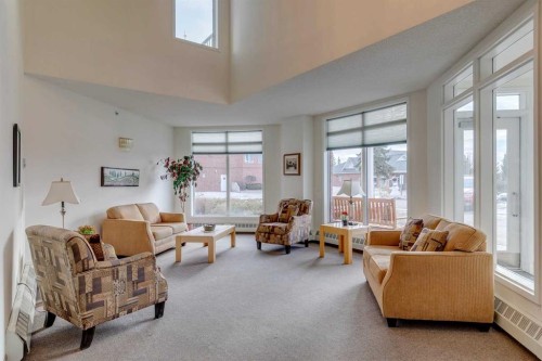 2309-2309 Hawksbrow Point Nw, Calgary, AB - Indoor Photo Showing Living Room