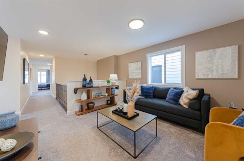 71 Ricardo Ranch Avenue Se, Calgary, AB - Indoor Photo Showing Living Room