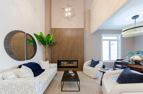 71 Ricardo Ranch Avenue Se, Calgary, AB - Indoor Photo Showing Living Room With Fireplace