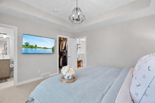 1053 West Lakeview, Chestermere, AB - Indoor Photo Showing Bedroom