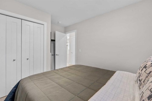 1053 West Lakeview, Chestermere, AB - Indoor Photo Showing Bedroom