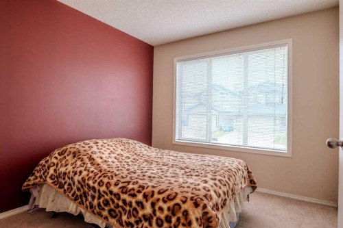 161 Saddlecrest Close Ne, Calgary, AB - Indoor Photo Showing Bedroom