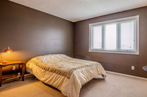 161 Saddlecrest Close Ne, Calgary, AB - Indoor Photo Showing Bedroom