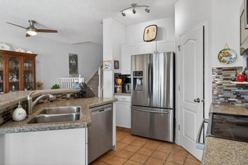 92 Hamptons Link Nw, Calgary, AB - Indoor Photo Showing Kitchen With Double Sink