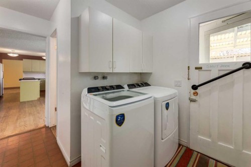 43 Mapleburn Drive Se, Calgary, AB - Indoor Photo Showing Laundry Room