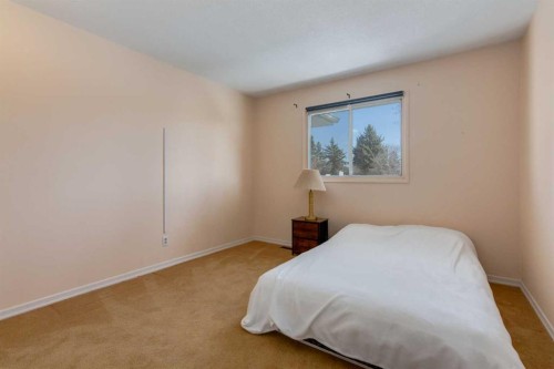 43 Mapleburn Drive Se, Calgary, AB - Indoor Photo Showing Bedroom
