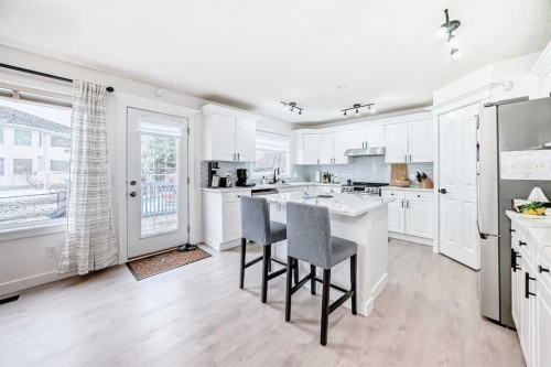 202 Hamptons Gardens Nw, Calgary, AB - Indoor With Fireplace