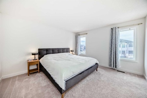 202 Hamptons Gardens Nw, Calgary, AB - Indoor Photo Showing Bedroom