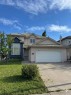 202 Hamptons Gardens Nw, Calgary, AB  - Outdoor With Facade 