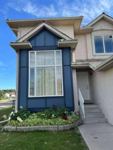 202 Hamptons Gardens Nw, Calgary, AB - Outdoor With Facade