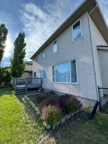 202 Hamptons Gardens Nw, Calgary, AB - Outdoor With Deck Patio Veranda With Exterior