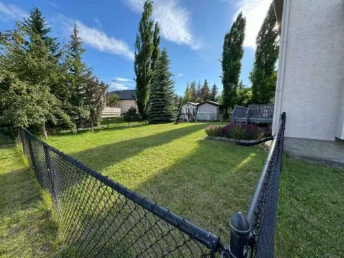 202 Hamptons Gardens Nw, Calgary, AB - Outdoor With Deck Patio Veranda With Exterior