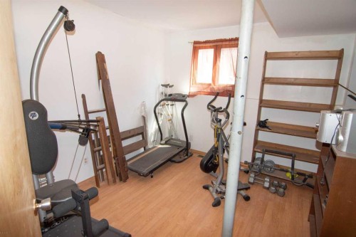 640 Mcculloch Crescent, Irricana, AB - Indoor Photo Showing Gym Room
