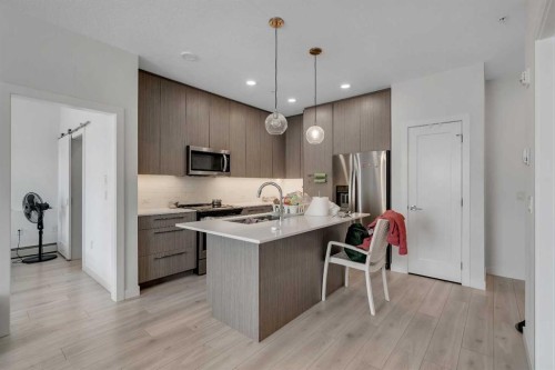 2225-76 Cornerstone Passage Ne, Calgary, AB - Indoor Photo Showing Kitchen With Stainless Steel Kitchen With Upgraded Kitchen