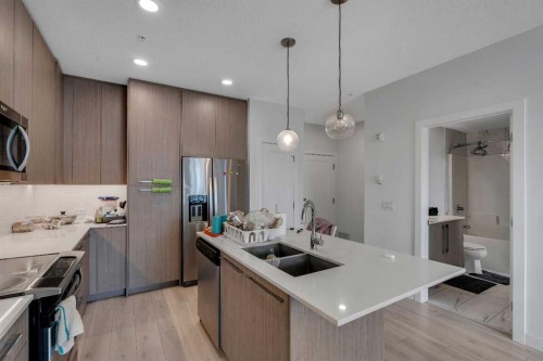 2225-76 Cornerstone Passage Ne, Calgary, AB - Indoor Photo Showing Kitchen With Stainless Steel Kitchen With Double Sink With Upgraded Kitchen