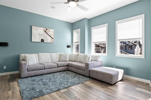22 Brightondale Park Se, Calgary, AB - Indoor Photo Showing Living Room