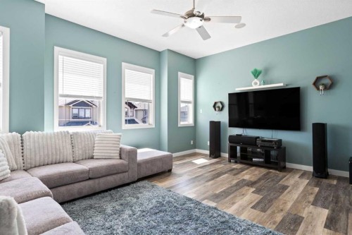 22 Brightondale Park Se, Calgary, AB - Indoor Photo Showing Living Room