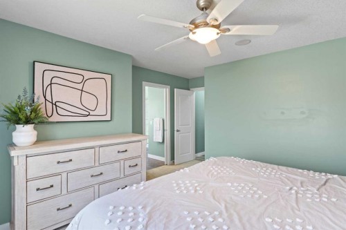 22 Brightondale Park Se, Calgary, AB - Indoor Photo Showing Bedroom