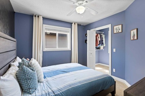 22 Brightondale Park Se, Calgary, AB - Indoor Photo Showing Bedroom