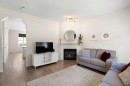 47 Covehaven Mews Ne, Calgary, AB  - Indoor Photo Showing Living Room With Fireplace 