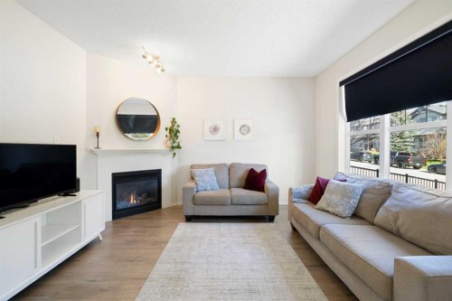 47 Covehaven Mews Ne, Calgary, AB - Indoor Photo Showing Living Room With Fireplace