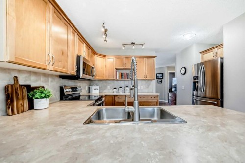 355 Ranch Ridge Court, Strathmore, AB - Indoor Photo Showing Kitchen With Double Sink