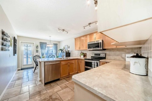 355 Ranch Ridge Court, Strathmore, AB - Indoor Photo Showing Kitchen With Double Sink