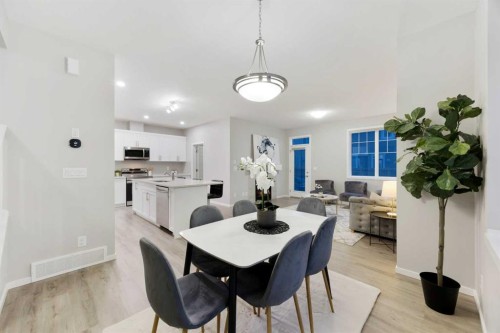 567 Osborne Drive Sw, Airdrie, AB - Indoor Photo Showing Dining Room