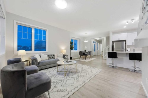 567 Osborne Drive Sw, Airdrie, AB - Indoor Photo Showing Living Room