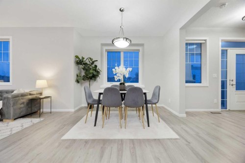 567 Osborne Drive Sw, Airdrie, AB - Indoor Photo Showing Dining Room