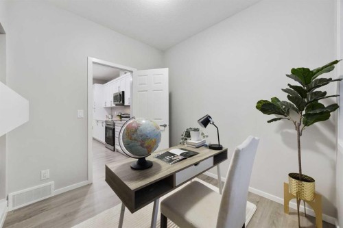 567 Osborne Drive Sw, Airdrie, AB - Indoor Photo Showing Other Room