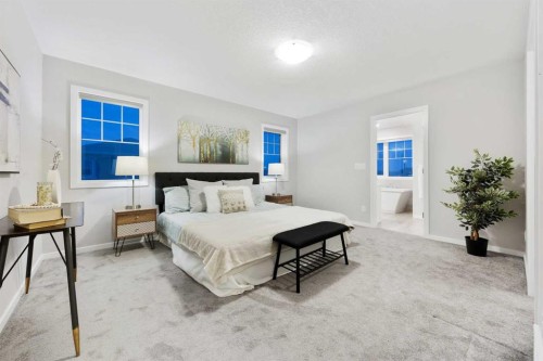 567 Osborne Drive Sw, Airdrie, AB - Indoor Photo Showing Bedroom