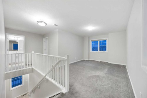 567 Osborne Drive Sw, Airdrie, AB - Indoor Photo Showing Other Room