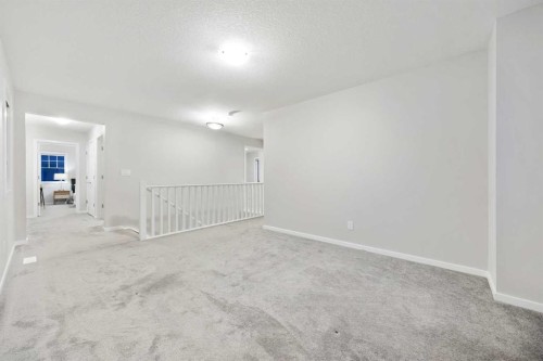 567 Osborne Drive Sw, Airdrie, AB - Indoor Photo Showing Other Room