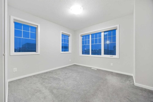 567 Osborne Drive Sw, Airdrie, AB - Indoor Photo Showing Other Room