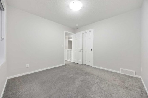 567 Osborne Drive Sw, Airdrie, AB - Indoor Photo Showing Other Room
