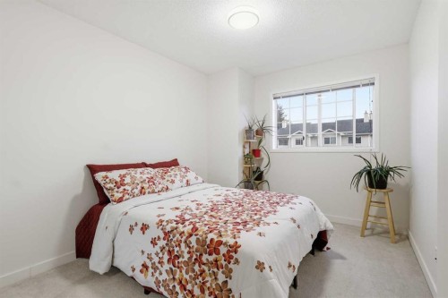 310 Hawkstone Manor Nw, Calgary, AB - Indoor Photo Showing Bedroom