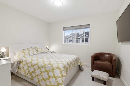 310 Hawkstone Manor Nw, Calgary, AB - Indoor Photo Showing Bedroom
