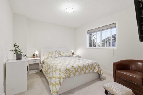 310 Hawkstone Manor Nw, Calgary, AB - Indoor Photo Showing Bedroom