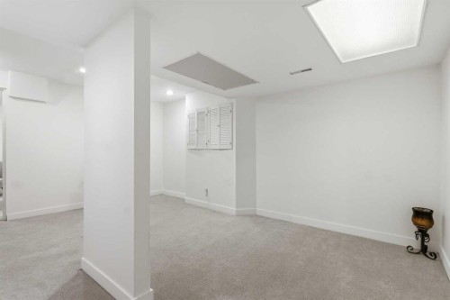 310 Hawkstone Manor Nw, Calgary, AB - Indoor Photo Showing Other Room